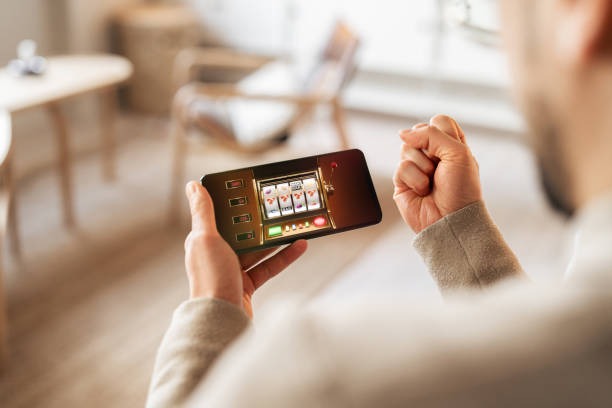 koboybet mobile app interface showing account dashboard and game categories